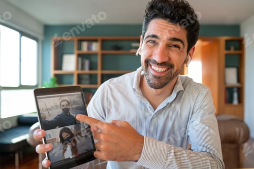 Preview: Man on a video call with friends.