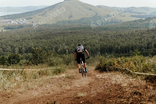 Preview: back rider of bicycle