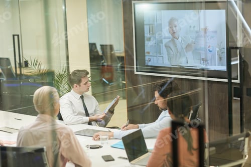 Preview: People at online conference behind the glass wall
