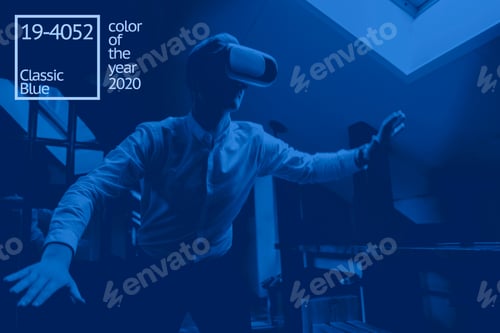 Preview: Amazed Office Worker Use Electronic Vr Glasses, Color Of The 2020 Year Trend, Classic Blue Tones