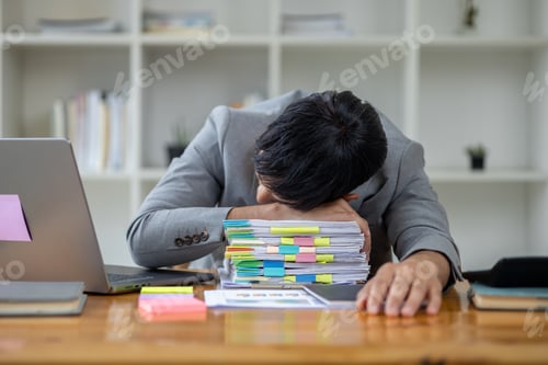 Preview: Startup businessman working and having body aches due to hard work, office syndrome, company executi