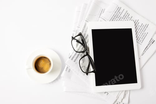 Preview: top view of glasses, cup of coffee, digital tablet and pile of newspapers, on white