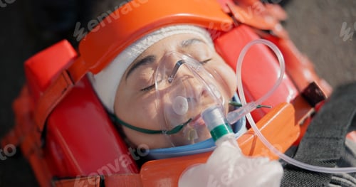 Preview: Person, accident and emergency on road with oxygen for life support, medical response to trauma wit