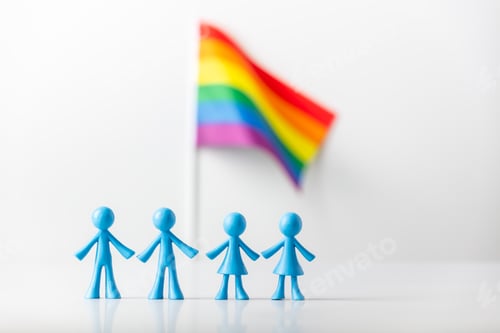 Preview: Plastic figures of gay and lesbizn couples and LGBT rainbow flag on light gray background