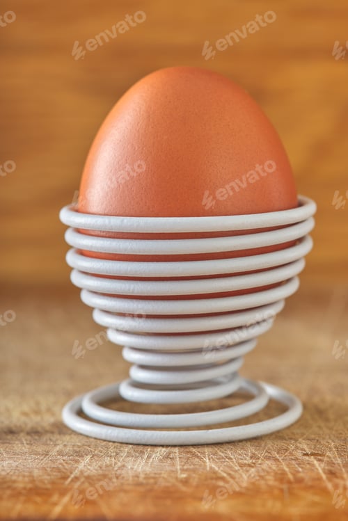 Preview: One boiled egg in a spiral-shaped metal support