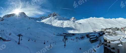 Preview: Winter drone shot of ski pistes and slopes covered with fresh powder snow in Tignes in Valdisere
