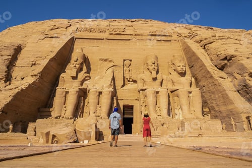 Preview: A tourist couple visiting the Abu Simbel Temple in southern Egypt in Nubia