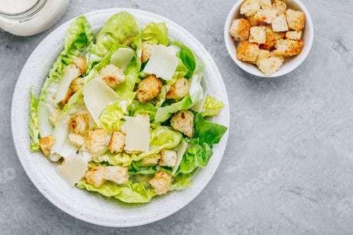 Preview: Classic Caesar Salad with Romaine Lettuce with Parmesan cheese and crunchy croutons.