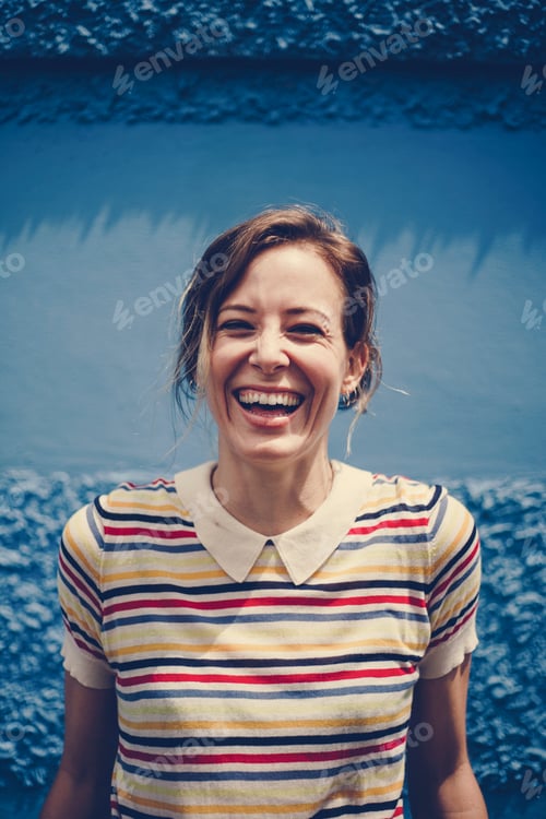 Preview: Portrait of caucasian beautiful woman with blue background