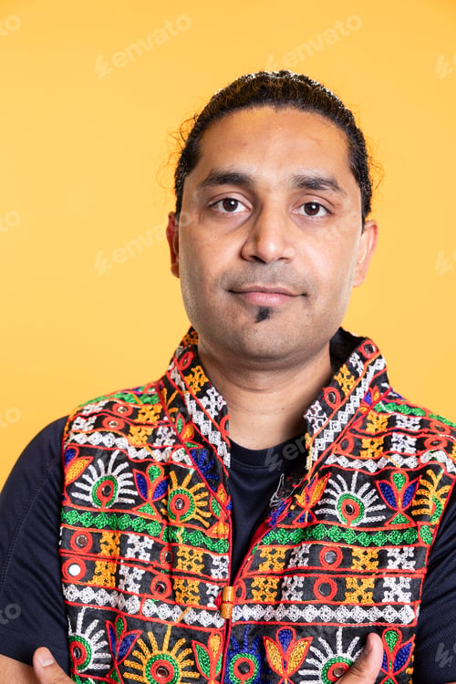 Preview: Portrait of optimistic man wearing colorful vest