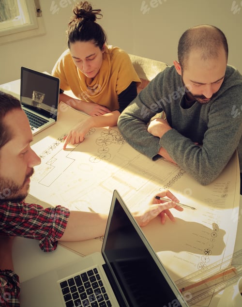 Preview: Young Group Of People/Architects Discussing Business Plans.