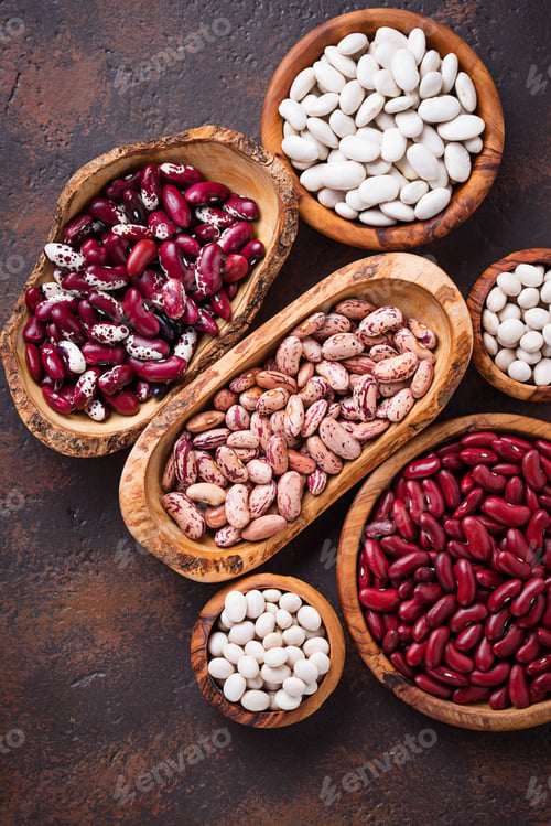 Preview: Assortment of various beans in wooden bowls