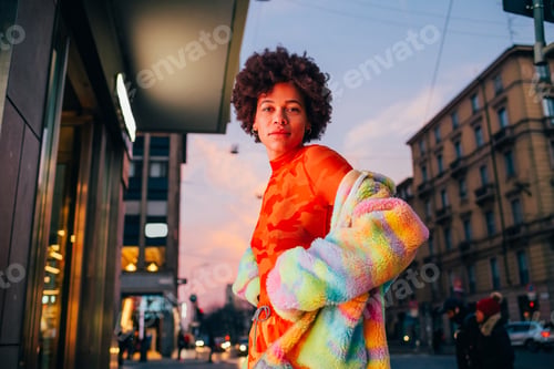 Preview: Young mixed race woman outdoor posing outdoor