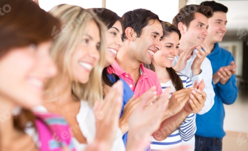 Preview: Group Of Young People Applauding And Looking Very Happy