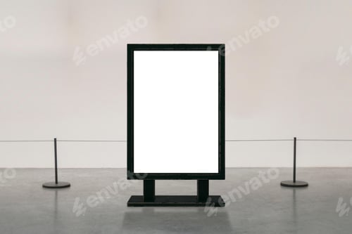 Preview: Blank Signage Against a Simple Wall in a Gallery