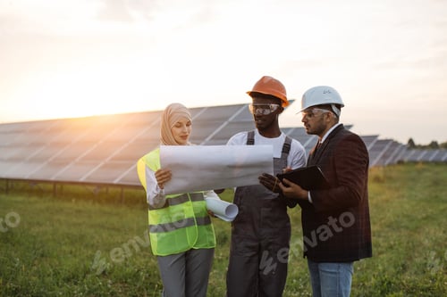 Preview: Multi ethnic people discussing work at solar station