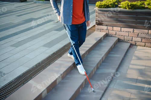 Preview: Close-up Of A Blind Man Standing With White Stick On Street