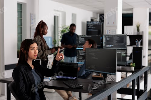 Preview: Asian web developer working with hologram and coding language