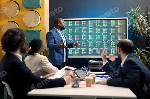Preview: Business colleagues conducting an informational meeting to share details