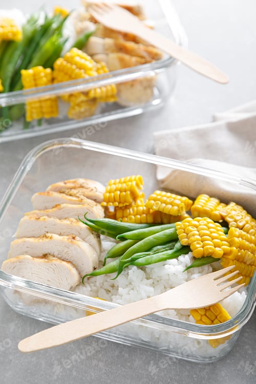 Preview: Lunch box containers with grilled chicken, rice and green beans with corn