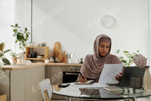 Preview: Woman Working From Home at a Table