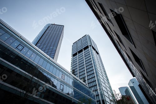 Preview: Low angle shot of high rise buildings under the clear sky in Frankfurt, Germany