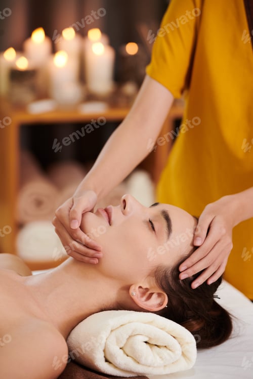Preview: Woman Receives Relaxing Facial Massage at Health Spa