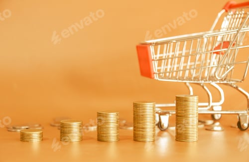 Preview: Stack of golden money coin on yellow background with small shopping cart.