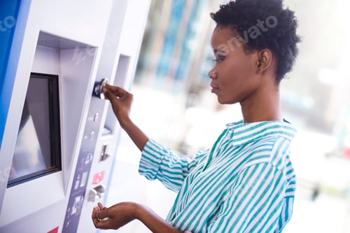 Preview: Woman at ticket machine
