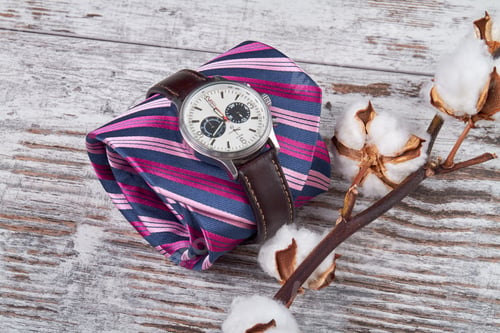 Preview: Composition of spring accessories on a white table.