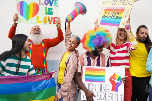 Preview: Group of multiethnic people dance at gay pride parade - LGBT and diversity concept