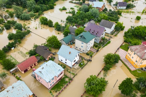 Preview: Aerial view of flooded houses with dirty water of Dnister river in Halych town, western Ukraine.