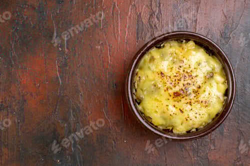 Preview: top view tasty julienne in bowl on brown background with copy place