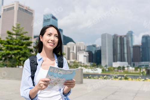 Preview: Woman use of city map in Hong Kong
