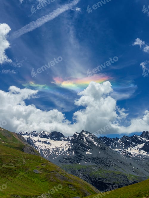 Preview: Iridescent cloud over the road to Stelvio pass (Lombardy) at summer