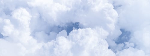 Preview: Blue sky with white clouds in sunny weather. Fluffy sky cloudy view atmosphere from airplane window