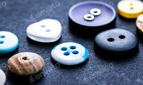 Preview: Close up view of sewing buttons