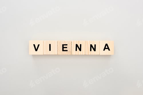 Preview: top view of wooden blocks with Vienna lettering on white background