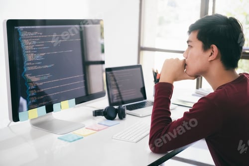 Preview: Computer programmer developing software application
