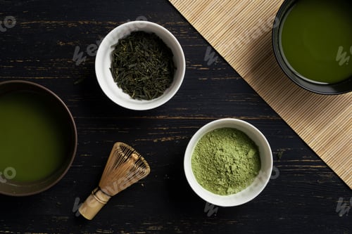 Preview: A serene matcha tea setup on a dark wooden surface.