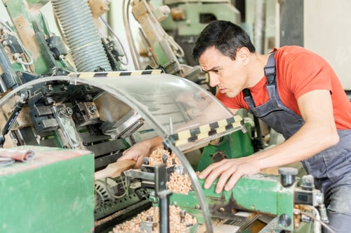 Preview: Man Working with Industrial Woodworking Machine
