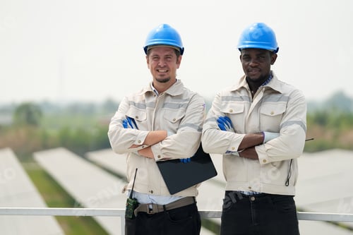 Preview: Solar power plant engineer examining photovoltaic panels. technician maintenance electric solution.