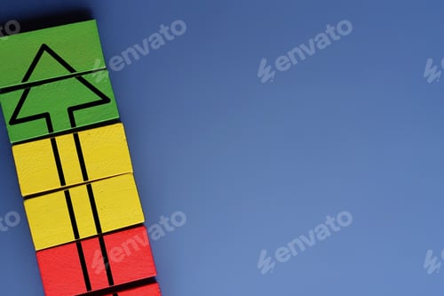 Preview: Wooden blocks with upward arrow on blue background with copy space