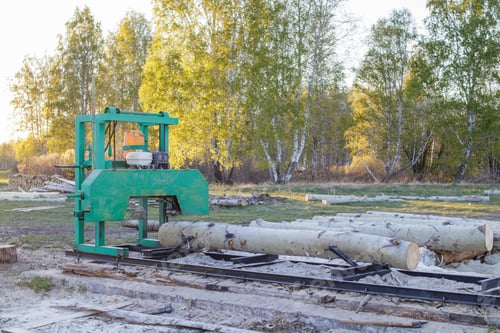 Preview: A small sawmill for processing wood in the countryside. Aspen logs