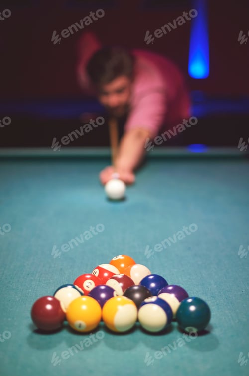 Preview: Man about to hit the cue ball