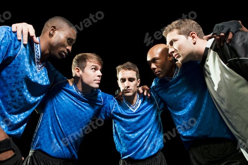 Preview: Team huddle under spotlight before the game