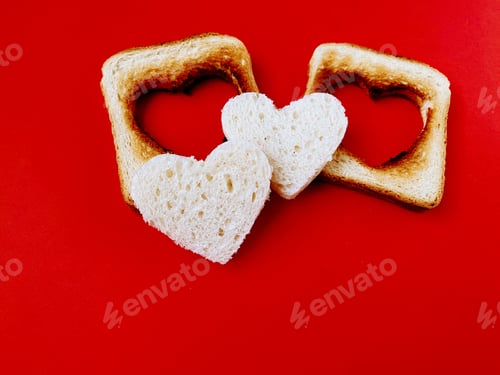Preview: Heart shaped bread for a breakfast. Concept of love, happiness and satisfaction.