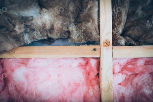 Preview: Pink and brown fiberglass insulations during house construction