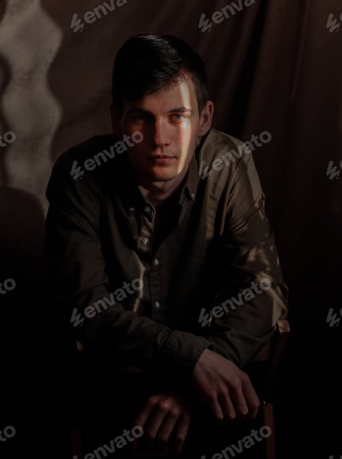Preview: Portrait of a young man. Light and shadow