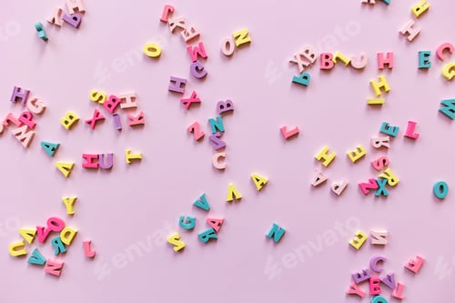Preview: learn english language. letters on pink background.